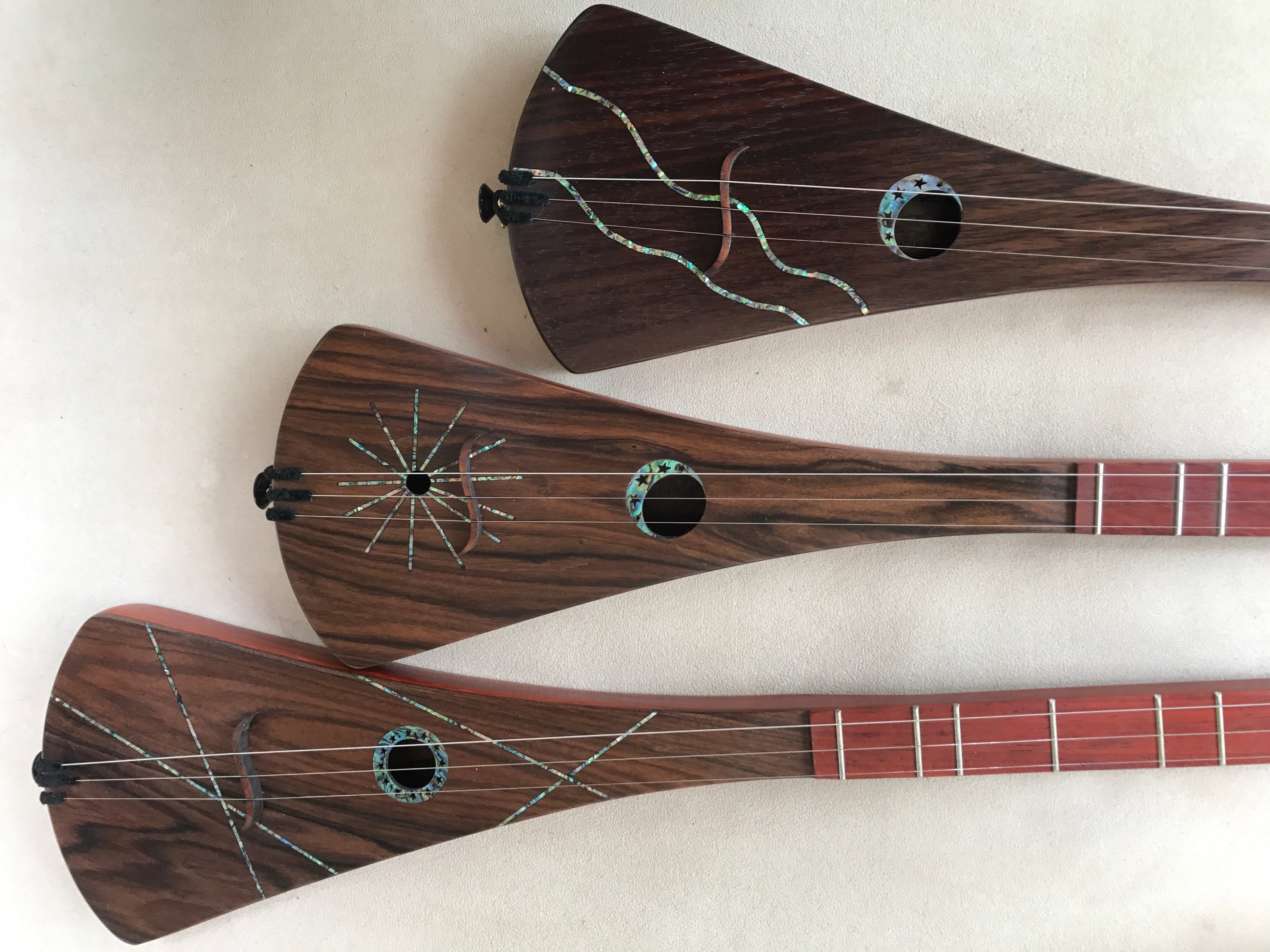 Woodburned Strumstick Designs