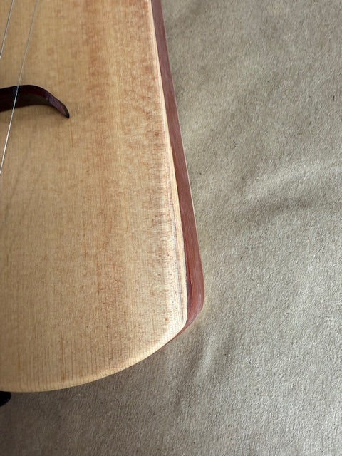 D Grand, rounded edge