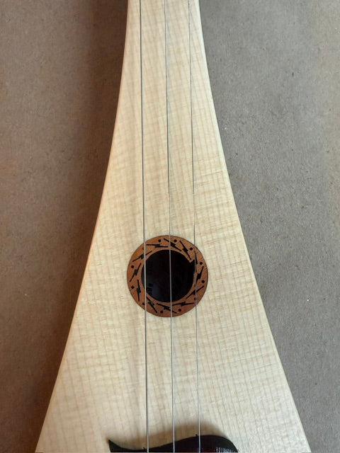 D Grand, small chip in Rosette